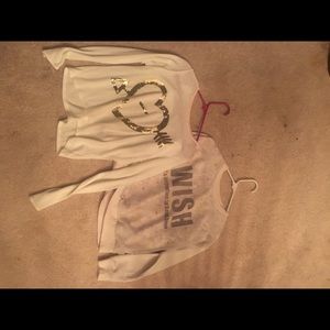 2 white long sleeve shirts